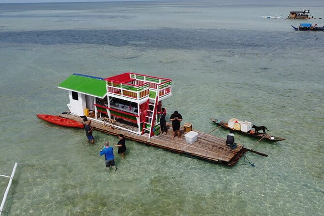 A Full Day Tour Adventure From Manila’s History to Volcano Views - Cruising Taal Lake by local boat