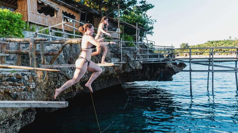 Boracay: Island Hopping & Cliff Jumping by Haqqy Life - The secret cliff-jumping stop and Magic Island