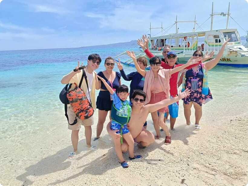 Boracay: Parasailing, Island Hopping, ATV Ride and Kawa Bath - Puka Shell Beach and the first boat stops