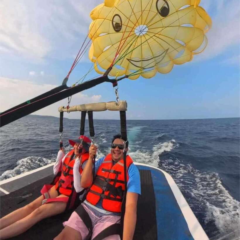 Boracay: Parasailing, Island Hopping, ATV Ride and Kawa Bath - Parasailing over Boracay’s white coast