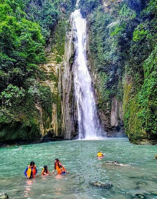 Cebu: Dao, Inambakan, Kawasan and Mantayupan Waterfalls Trip - A short lunch stop in Badian