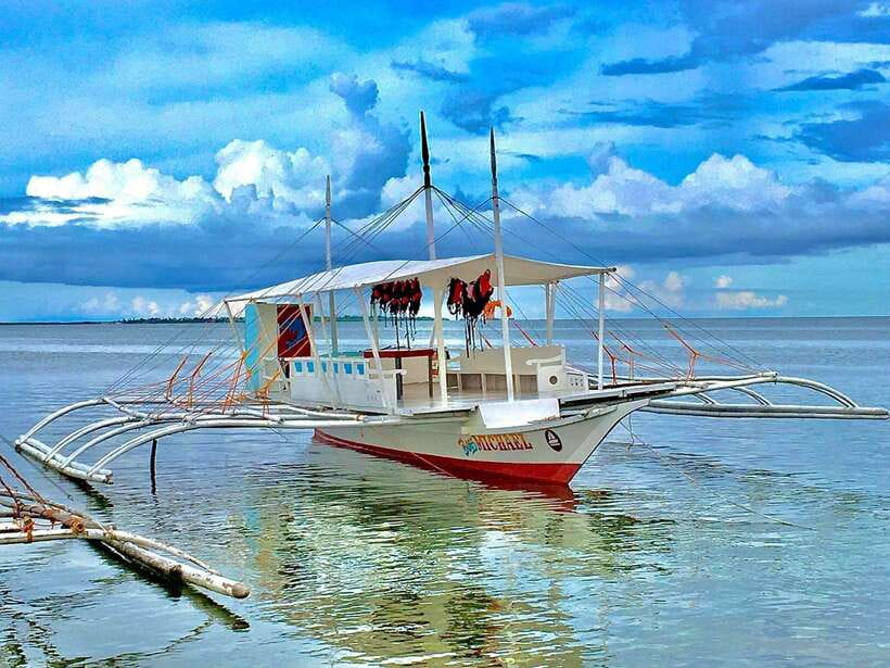 Cebu Island Hopping with Lunch - Nalusuan Island: lunch, sand, and unhurried water time