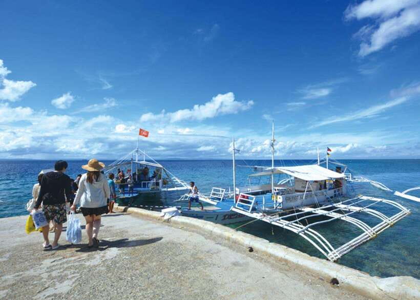 Cebu: Mactan Island Hopping Boat Tour with Lunch - Nalusuan combines reef time with the main meal