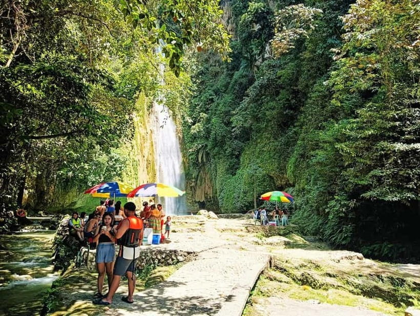 Cebu: Mantayupan Falls, Hermit's Cove & Bojo River Eco Tour - Guide service and the human side of the tour