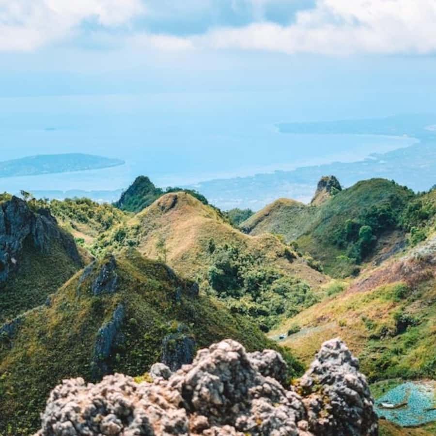 Cebu: Osmeña Peak and Kawasan Canyoneering Day Tour - Osmeña Peak before the crowds and heat