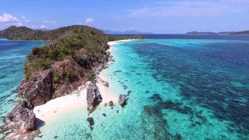 Coron: Coastal Cliffs, Beach & Malcapuya Island Hopping Tour - Three famous islands, one full day on the water