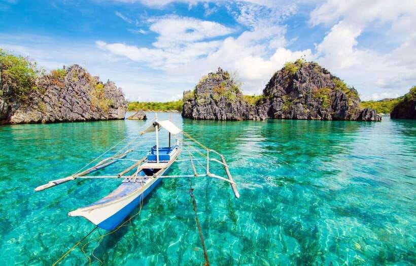 Coron: Coastal Cliffs, Beach & Malcapuya Island Hopping Tour - Banana Island: hammocks, sand, and an easy first stop