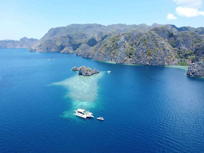 CORON:ISLAND TOUR A Lakes and Snorkeling with Corals - Kayangan Lake and the famous viewpoint