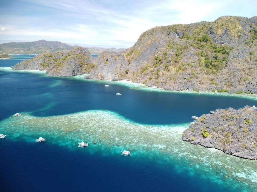 Coron: Island Tour B w/ Snorkeling & Lagoon Adventures - Twin Lagoon and the thrill of changing water