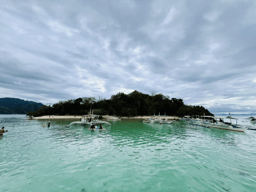 Coron: Private Boat Hire with Guided Tour and Lunch on Beach - Beaches, Caves, and the Seven-Site Choice