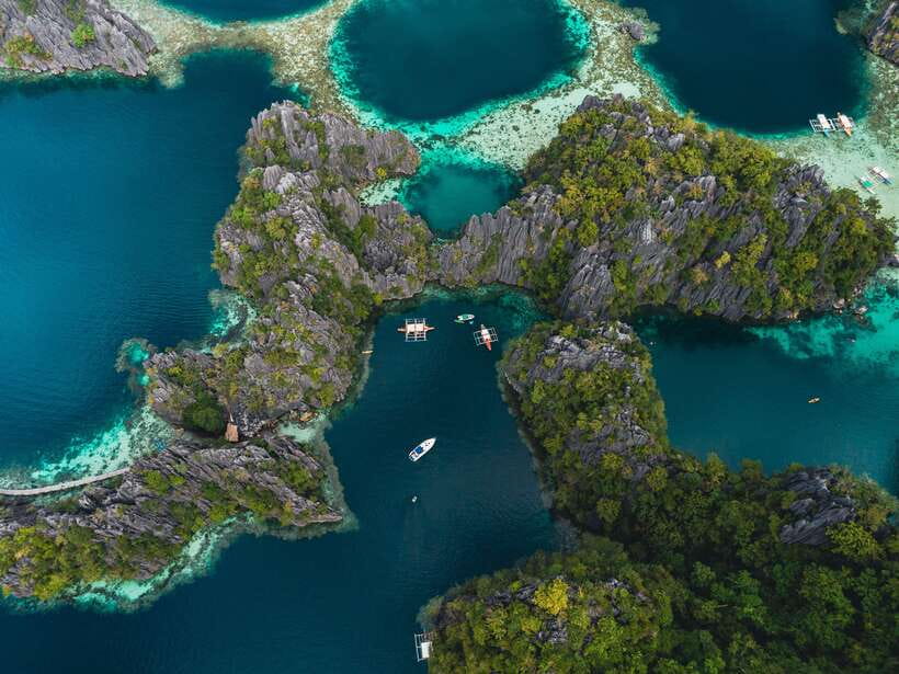 Coron: Private Island-Hopping Tour on a Yacht or Speedboat - Barracuda Lake and underwater scenery