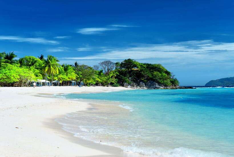 Coron Town: Coron Island Escapade Private Tour with Lunch - Malcapuya Island and the classic beach stop