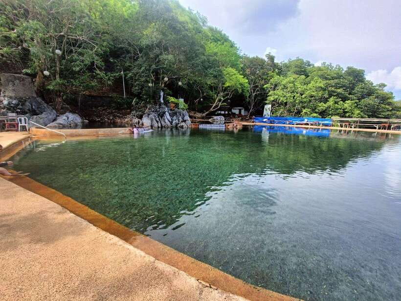 Coron Town Tour: Maquinit Hotspring & Mt. Tapyas Trekking - Coron Town Plaza shows the town at ground level
