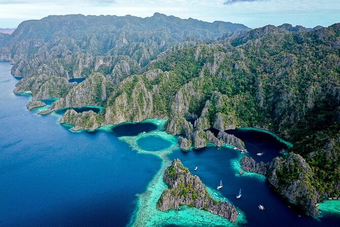 Coron Ultimate Tour - Full Day Group Tour w/ Lunch - Swimming between the lagoons