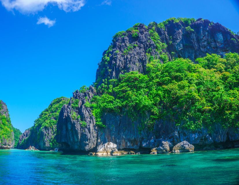 El Nido: Full-Day Premium Island Hopping Catamaran Cruise - Lunch, snorkeling, and time to slow down