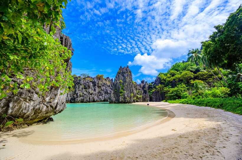 El Nido: Island Hopping and Snorkeling Private Boat Tour C - Secret Beach rewards the final swim