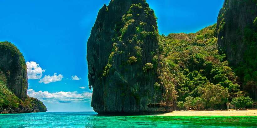El Nido: Island Hopping Tour A Lagoons and Beaches - Seven Commandos Beach brings the easy finish