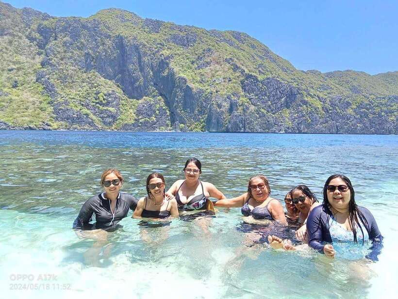 El Nido: Shared Island Hopping Tour C with Buffet Lunch - Helicopter Island brings coral, cliffs, and an easy first swim