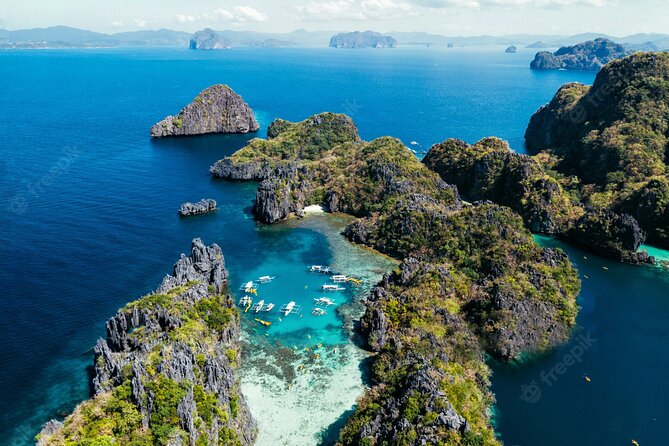El Nido Tour A - Big Lagoon Premium Tour (Private / Shared) - Seven Commando Beach closes the day with sand and palm trees