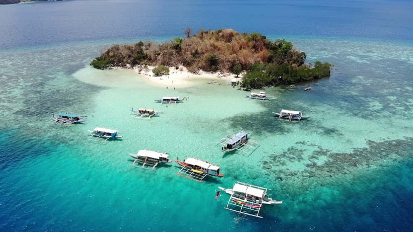 From Coron: Island Hopping Boat Day Trip with Buffet Lunch - Twin Lagoon, where two waters meet