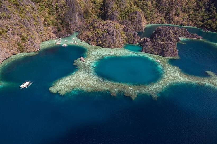 From Coron: Island Hopping Boat Day Trip with Buffet Lunch - Kayangan Lake and the famous Coron views