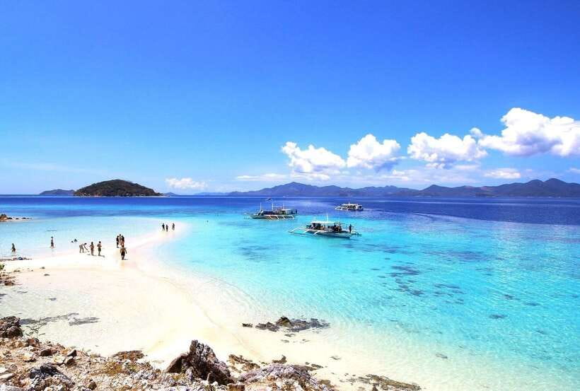 From Coron: Private Island-Hopping Cruise with Lunch - Banana Island and its curved beach