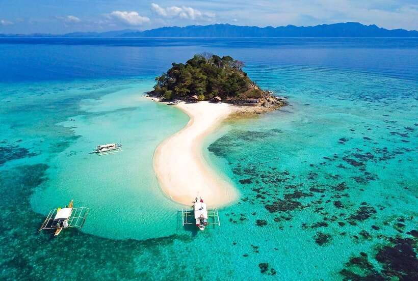 Hidden Gems of Coron A: Kayangan Wonders & CYC Beach Day - Reef stops trade lake water for sea life