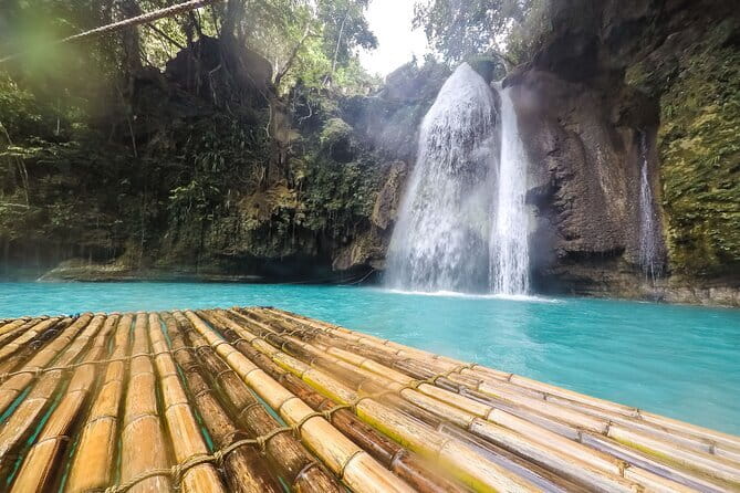 Kawasan Falls Canyoneering Tour from Moalboal - Collecting safety gear in Badian