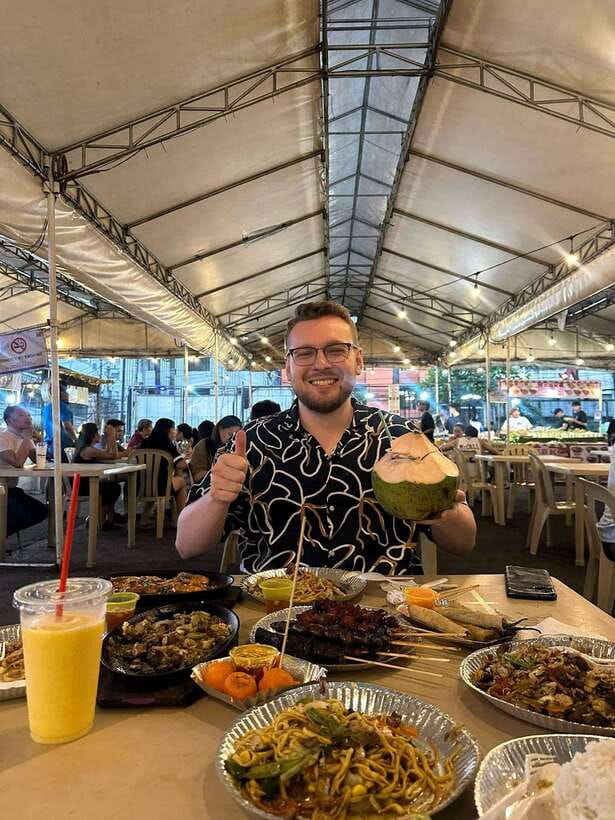Makati Street food Tour, End with a Rooftop City View - From City Garden Grand Hotel into Makati after dark
