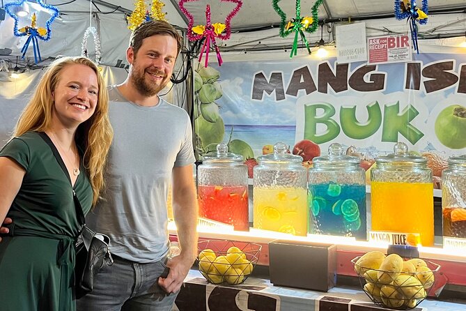Makati Street Food Tour Experience - Food, drinks, live music, and a souvenir photo