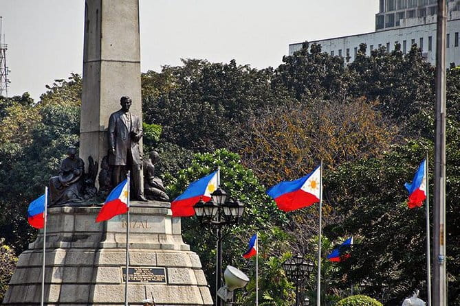 Manila Old & New City Walking Tour With A Guide - Walking through Intramuros