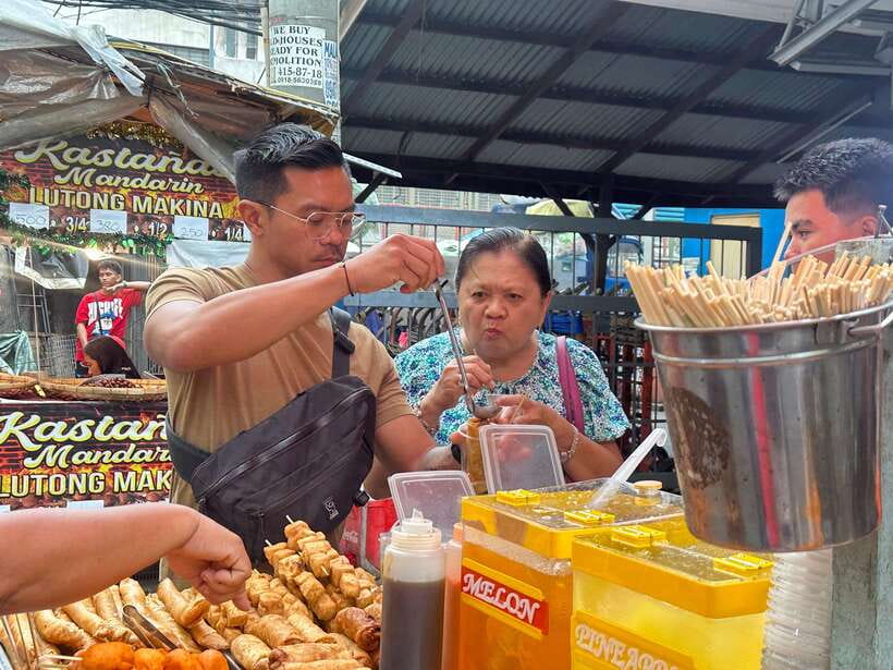 Manila Street Food and Drinks with Tuktuk Experience - Grilled squid, mango, and the bold side of Filipino flavor