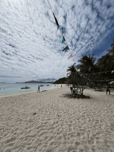 Private Boat for Culion Island Escapade Tour - Meeting your guide at the local market