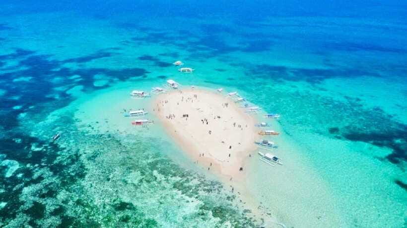 SIARGAO: PRIVATE ISLAND HOPPING GUYAM, DAKU AND NAKED ISLAND - Daku Island, the main three-hour break